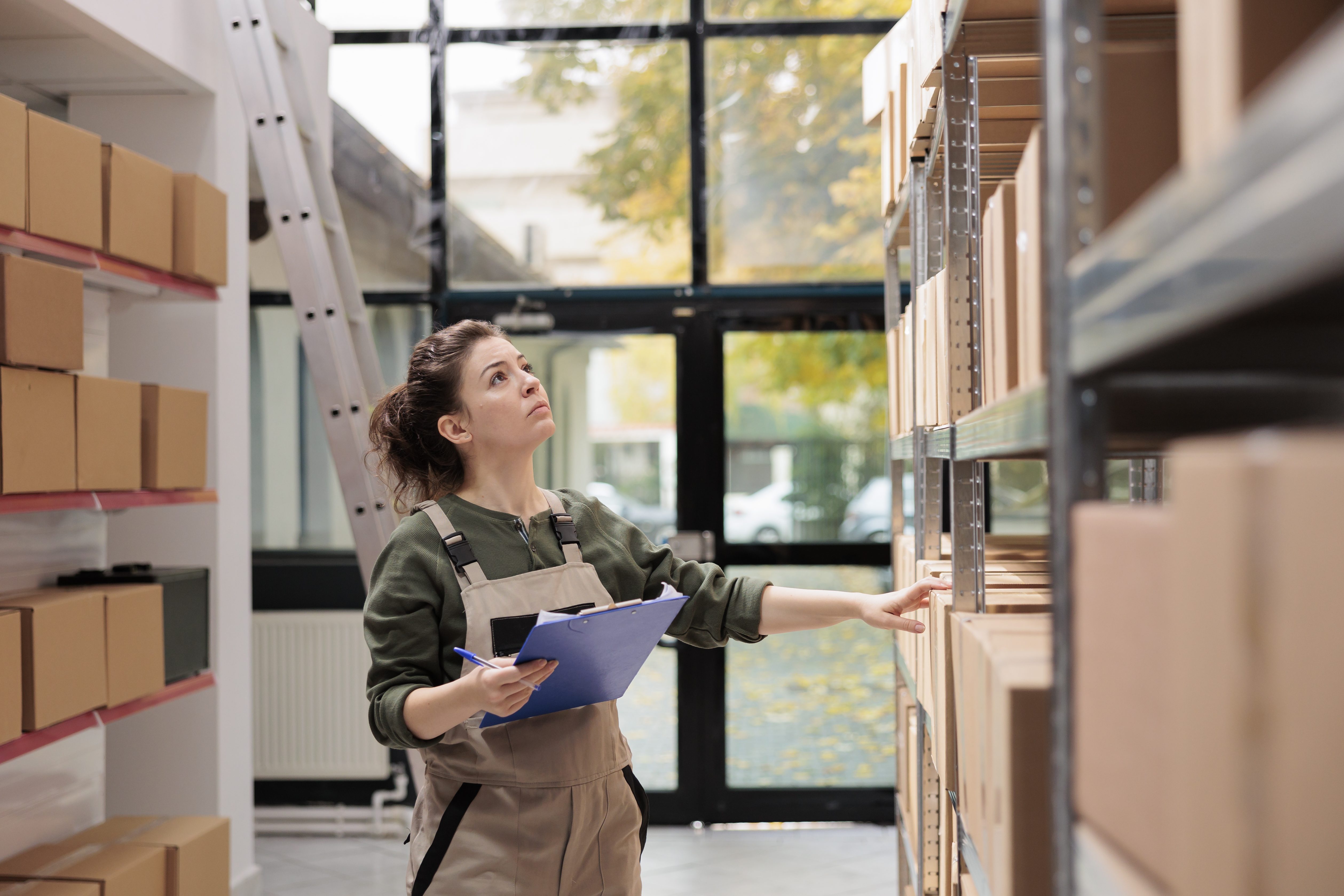 Small business owner managing spring inventory surge with business storage near Luling, TX